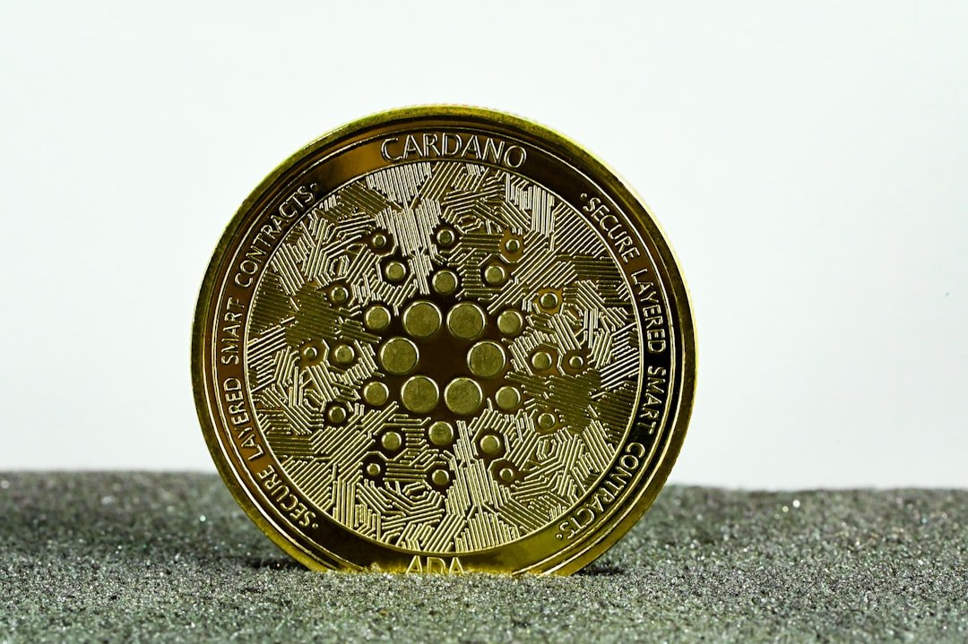 Close-up of a cryptocurrency coin on a table surface
